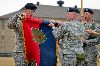 Maj. Gen. William Mayville and Command Sgt. Maj. Charles Sasser, 1st Inf. Div. command team, furl the 1st Inf. Div. headquarters' colors during a casing ceremony March 7 at Fort Riley. Mayville and Sasser will soon lead the Big Red One's headquarters  and DHHB to Afghanistan, where they will head up Regional Command-East.  
Amanda Kim Stairrett | 1st Inf. Div.
