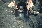 Smoldering cloth on end of stick, Nyamuragira Volcano, Zaire