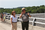 Blue Marsh Lake Natural Resource Manager John Cave explains the history of the dam to Ms. Jo-Ellen Darcy, the Assistant Secretary of the Army for Civil Works. 