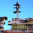 ShareThis blog was compiled by LCDR Heidi Lenzini, Public Affairs Officer, Naval History and Heritage Command. When a mast is about to be stepped – the process of raising a...