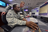 2SOPS officers at a workstation