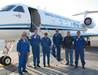 Crews standing at the front of aircraft