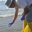 Man taking sample of water