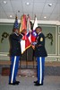 Command Sgt. Maj. Michael E. Williams, Support Troops Battalion, Third Army/ARCENT, is presented a folded American flag during his retirement ceremony where he also received the Legion of Merit award, Dec 8, at the Carolina Skies Club. Williams is retiring after 30 years of military service. Photo by Sergeant 1st Class Tony J. Spain, Third Army/ARCENT Public Affairs Office.