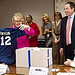 Secretary Clinton Is Presented a Football Jersey