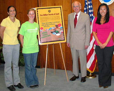 The Volpe Center's second round of donations to the Feds Feed Families program were provided in July 2009 the East End House of Cambridge.Left to right: Rebecca Gallo, Director of Special Projects, and Emily Bullen, Director of Community Programs, East End House, Richard John, Volpe Center Director Emeritus; and Effie Cho, Volpe Center Human Resources Division.