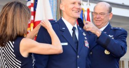 Col. James Eifert (center) is promoted to the rank of brigadier general and officially "pinned" by his wife Beth and the Adjutant General of Florida Maj. Gen. Emmett Titshaw Jr. during a ceremony in St. Augustine, Fla., Feb. 8, 2013. Concurrently Eifert assumed the position of Assistant Adjutant General for Air and Deputy Commander of the Florida Air National Guard. Photo by Master Sgt. Thomas Kielbasa