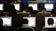 **FILE** Chinese Internet surfers play online games at an Internet cafe in Beijing, China, in this Wednesday, Feb. 15, 2006.  