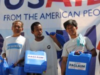 USAID/OFDA, in partnership with Catholic Relief Services, also provided hygiene kits, water containers, sleeping mats, and water purification tablets to families in a village on the outskirts of New Bataan city which bore the brunt of the storm. Photo credit: Lisa Gabriel, USAID/OFDA