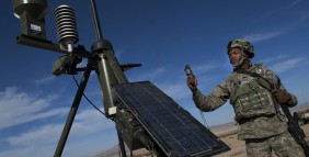 Senior Airman Michael Richardson takes weather readings with a TMQ-53 tactical weather sensor during training at Fort Irwin, Calif.