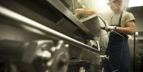Salisbury stirs the night's meal at the dining facility at Joint Base Charleston.