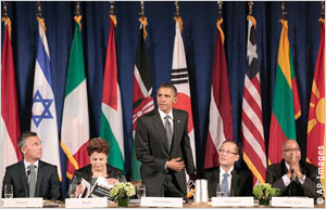 President Obama takes his seat for a meeting with leaders of the Open Government Partnership (Photo: AP Images)