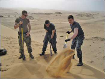 Sailors dig a hole