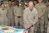 CAMP ARIFJAN, Kuwait (November 10, 2009) - Marine Col. John C. Wright, officer in charge, Marine Corps Central Command Coordination Element Kuwait, cuts the birthday cake during a Marine Corps Birthday cake-cutting ceremony at Camp Arifjan, Kuwait, Nov. 10. The first two pieces of cake are given to the oldest and youngest Marines. On this date in 1775, the Continental Congress authorized two battalions of Marines, and Marines celebrate this day around the world. The Marines assigned here started off celebrating the 234th Marine Corps Birthday by hosting a 5K run and will also attend the Marine Corps Ball at the U.S. Embassy in Kuwait Nov. 13. Third Army/U.S. Army Central continues to work side by side with the Marines in Kuwait as they support operations in the CENTCOM area of responsibility. Photo by Staff Spc. Brandon Babbitt, Third Army /203 Public Affairs Detachment.