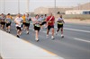 CAMP ARIFJAN, Kuwait (November 11, 2009) - Over 900 Soldiers, Sailors, Airmen, Marines and civilians attached to Third Army at Camp Arifjan, Kuwait, participated in a Veteran’s Day 5k run on Nov. 11, 2009.  The run began at 6 a.m. after a moment of silence was held to honor all those Servicemembers who have served the United States in armed conflicts from World War I to the War on Terrorism, and most recently those killed and wounded during the Ft. Hood shooting of Nov. 5, 2009. Photo by Sgt. Daniel W. Lucas, Third Army PAO, 203rd Public Affairs Detachment.
