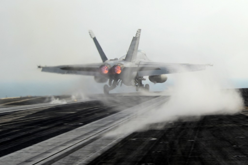 130128-N-OY799-113 U.S. 5TH FLEET AREA OF RESPONSIBILITY (Jan. 28, 2013) An F/A-18E Super Hornet from the Tophatters of Strike Fighter Squadron (VFA) 14 launches from the aircraft carrier USS John C. Stennis (CVN 74). John C. Stennis is deployed to the U.S. 5th Fleet area of responsibility conducting maritime security operations, theater security cooperation efforts and support missions for Operation Enduring Freedom. (U.S. Navy photo by Mass Communication Specialist 2nd Class Kenneth Abbate/Released)