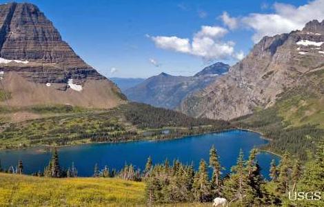 Hidden Lake in Glacier National Park, Montana, USA, a high mountain lake in an alpine setting. This lake is kept full of water mainly from precipitation runoff from the surrounding hills and, in the spring, from snowmelt. Photo credit: Lisa McKeon, USGS