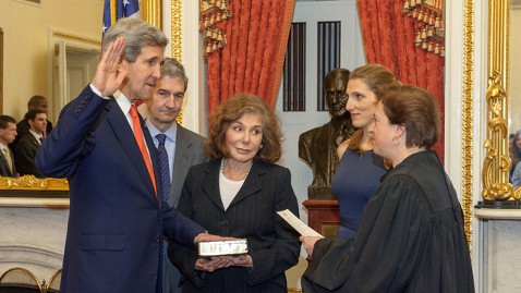 Click through for image source. John Kerry takes his oath of office on a bible held by his wife, Teresa Heinz Kerry.