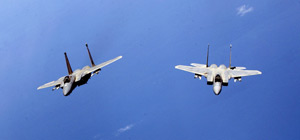 Two F-15 Eagles from the Florida Air National Guard's 125th Fighter Wing fly near Jacksonville International Airport, Florida.