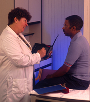 Doctor performs examination on veteran patient