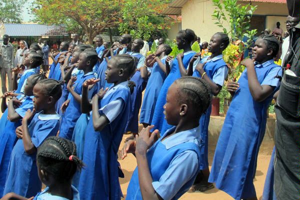 Wau (South Sudan) - At the Mary Health Center, local children sing for Security Council members