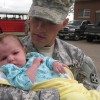 Former Staff Sgt. Clinton L. Romesha with his son, Colin who was born after Romesha returned from his 2009 deployment to Afghanistan, where his actions helped save Combat Outpost Keating. Those actions will be recognized with the Medal of Honor in a Feb. 11, 2013 White House ceremony. He misses the Army, he said, but doesnât miss having to leave family. (Photo courtesy of Clinton L. Romesha)