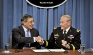 Defense Secretary Leon E. Panetta and Army Gen. Martin E. Dempsey, chairman of the Joint Chiefs of Staff, shake hands after signing a memo to lift the ban on women from serving in military combat roles as they address reporters at the Pentagon, Jan. 24, 2013. DOD photo by Glenn Fawcett