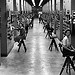 Calutron Girls shown operating the electromagnetic separation units (Calutrons).  Gladys Owens is on the right.  She said hair pins would fly out of her hair and stick to the equipment because of the high level of magnetism in the room.