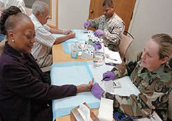 Retiree gets blood drawn at Retiree Appreciation Day.