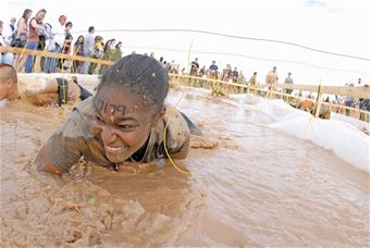 Luke Airmen participate in Tough Mudder