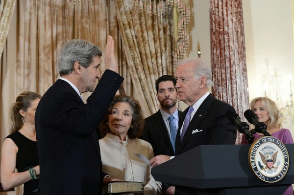 Vice President Joe Biden swears in Secretary of State John Kerry, surrounded by his family, at the U.S. Department of State in Washington, D.C., February 6, 2013.