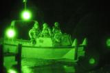 Soldiers taking part in a 12C30 course at Camp Grafton Training Center launch MK11 Bridge Erection Boats onto Lake Coe and prepare to assault an island during a situational training exercise. 