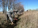 ND National Guard Soldiers practice building a fire line during Wildland Firefighter training in Bismarck. The three-day training certified and re-certified Red Cards for 38 Guardsmen, and more will train next month in Fargo.