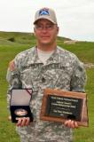 Sgt. 1st Class Russell Gerhardt, who serves at Camp Grafton Training Center, received both the Top Pistol Marksman 2011 and Top Gun 2011 awards at the NDNG Adjutant General's Combat Marksmanship Match at Camp Grafton South. 