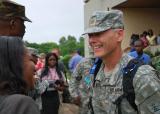 Maj. Curtis Kroh, with the NDNG's 814th Medical Company, talks with a reporter about MEDFLAG 11, a bilateral exercise in Accra, Ghana. 