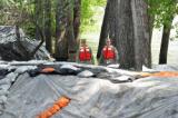 ND National Guard Soldiers Spc Joseph Petermann, Fargo, N.D. and Spc. Mackenzie Petersen, Bismarck, N.D. patrol a levee in the Captain’s Landing area of Mandan, N.D. 