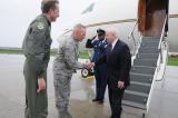 Col. Rick Gibney, 119th Wing commander, greets U.S. Secretary of Defense Dr. Robert Gates as Gibney and Col. Kent Olson welcome Dr. Gates at the N.D. Air National Guard, Fargo, N.D. Dr. Gates is flying into Fargo to speak at NDSU's commencement.