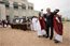  President George W. Bush greets cultural dancers during his visit Tuesday, Feb. 19, 2008, to the dedication and official opening of the new U.S. Embassy in Kigali, Rwanda. White House photo by Eric Draper