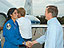 KSC-06PD-2632 -- Launch Director Mike Leinbach welcomes STS-116 Mission Specialist Sunita Williams