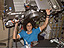 ISS014-E-15350 -- Astronaut Sunita Williams hoists the TVIS