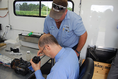 Rural Development Utilities Administrator Jonathan Adelstein receives lesson in  fiber splicing. Photo credit: USDA employee Delane Johnson.