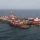 Tug boats assist in the response to Bouchard Barge No. 120.