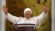 Pope Benedict XVI waves to faithful during the Angelus prayer from the window of his Castel Gandolfo summer palace, on the outskirts of Rome, Sunday, Sept. 11, 2005. 