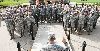 Col. Michael Pappal, 1st ABCT commander, re-enlists more than 40 Soldiers at an Oct. 9 mass re-enlistment ceremony at Cavalry Parade Field.  Photo by: Sgt. Kerry Lawson, 1ST ABCT.