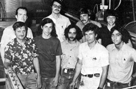 NAL staff successfully testing magnet, brought to NAL from the University of Chicago include (front row, L-R): B. Williams, C. Worel, K. Roy, P. Burton (Oxford); (Back row, L-R): G. Woods, G. Ross, J. Walker, and D. Williamson