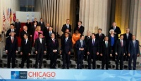 Date: 05/20/2012 Description: The NATO leaders gather for a group picture upon their arrival for dinner at Soldier Field in Chicago, May 20, 2012. © AP Image