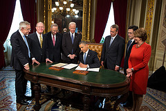 Speaker John Boehner looks on as President Obama signs the Oath of Office in the President's Room at the U.S. Capitol. January 21, 2013.  (Official Photo by Bryant Avondoglio)

--
This official Speaker of the House photograph is being made available only for publication by news organizations and/or for personal use printing by the subject(s) of the photograph. The photograph may not be manipulated in any way and may not be used in commercial or political materials, advertisements, emails, products, promotions that in any way suggests approval or endorsement of the Speaker of the House or any Member of Congress.