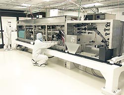 Technician Installing Preamplifier Module