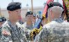 Col. Jeffery Broadwater accepts the colors of the 2nd HBCT from Brig. Gen. Donald MacWillie, senior commander, Fort Riley, June 5 during the brigade’s change of command ceremony at Cavalry Parade Field.