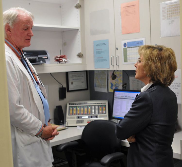 Senator Boxer being briefed by Dr. James Loftus.